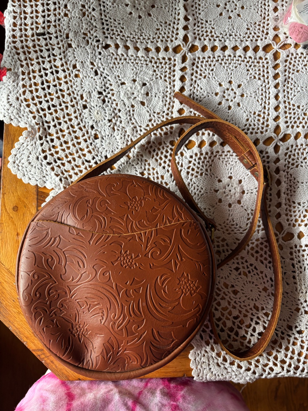 Portland Leather Embossed Round Crossbody Bag in Brown